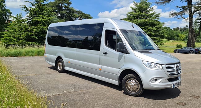 Silver 16-seater Mercedes-Benz Sprinter minibus for UK group transfers